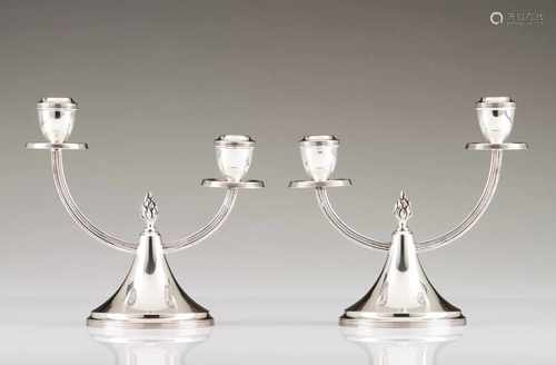 A pair of 2 branch candelabraPortuguese silverConycal body toped by flame finial and fluted drip