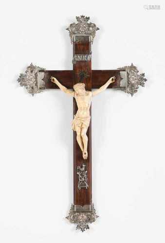 A crucified ChristIvory sculptureRosewood cross with applied silver elementsPortugal, 19th century(