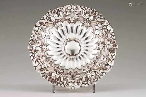 A salverPortuguese silverGadrooned decoration; raised and chiselled lip; volutes, acanthus and shell