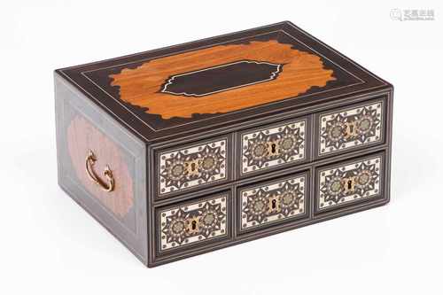 A small Indo-Portuguese cabinetEbony and SissooIvory friezesDrawer fronts decorated with stars in