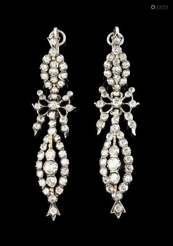 A pair of pendant earringsSilver 19th / 20th centuryButton, bow and pendant set with translucent