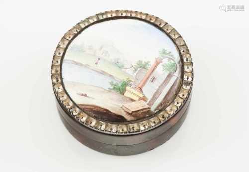 A round lided boxTortoiseshellEnamelled plaque lid of polychrome decoration depicting a riverscape