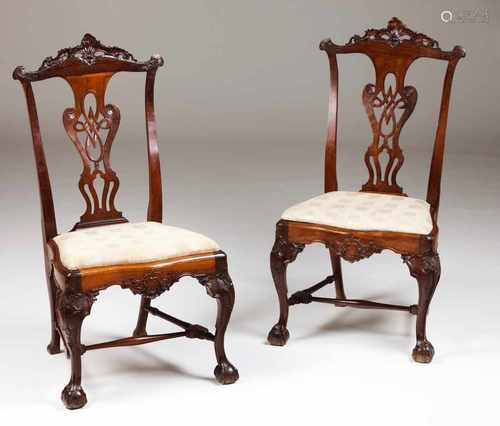 A pair of D. José chairsRosewoodPierced and scalloped splatsCarved crest, splats and legsClaw and