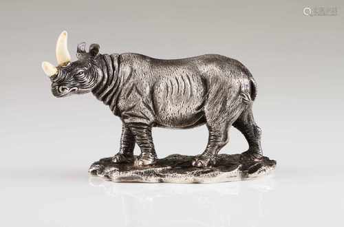 A rhinocerosPortuguese silverRhinoceros sculpture with two bone hornsGreats of Africa