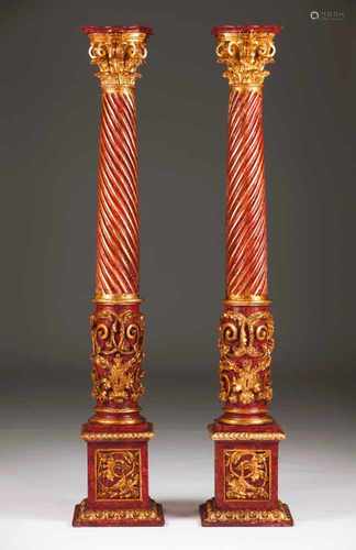 A pair of columnsCarved, painted and gilt woodCorinthian carved capitals, twisted shafts and marbled