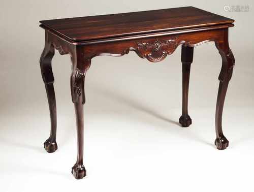 A George II style tea tableRosewoodCarved decoration with shell and floral motifs; ball and claw