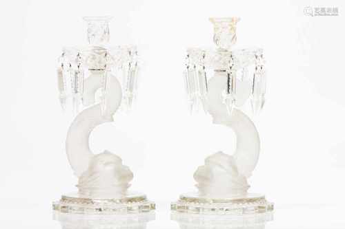 A pair of candlesticksMolded glass stems representing dolphinsCut crystal pendants20th century(one