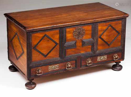 A chestBrazilian rosewood with rosewood turned elementsTwo drawers and bun feetYellow metal