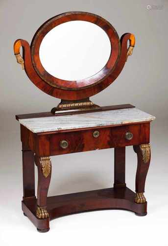 An Empire style dressing tableMahogany and burr mahogany veneered timberCarved and gilt