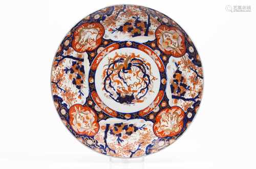 A large plateJapanese porcelainPolychrome Imari decoration with phoenix and floral motifsLip