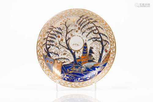 A saucerChinese export porcelainRich polychrome decoration in shades of blue, salmon and gold