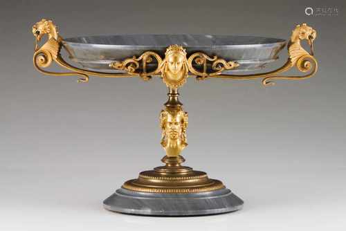 A large bowlGrey marble and chiselled and gilt bronzeDragon shaped handles and female head applied