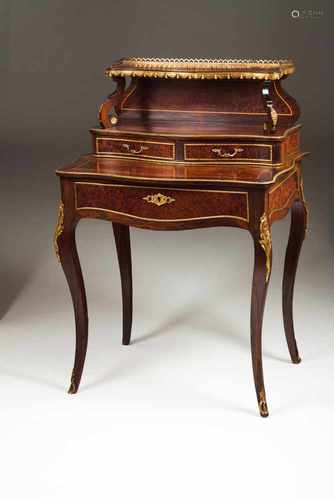 A Napoleon III style Bonheur du JourRosewood veneered woodBrass mountsThree drawers20th