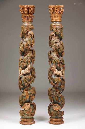 A pair of twisted columsCarved, gilt and polychrome woodDecorated with baroque carving of vine