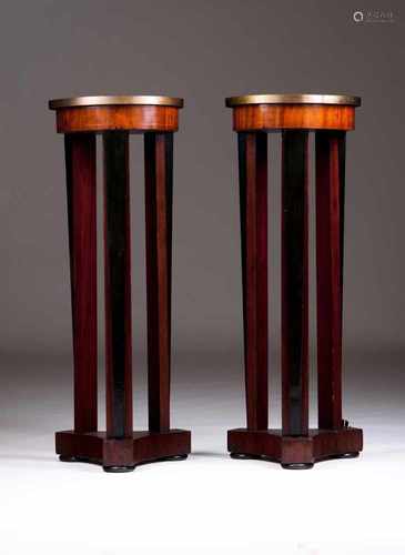 A pair of Empire pedestalsMahogany and black lacquered wood, yellow metal mountFrance, 19th century