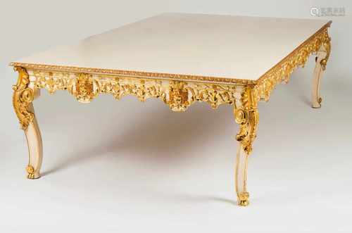 A large tableLacquered and gilt woodCarved decoration of foliage scrolls, classical masks and