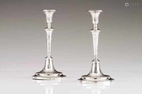 A pair of D.Maria candlestandsPortuguese silverFluted shaft, cups and stand of deep grooves and