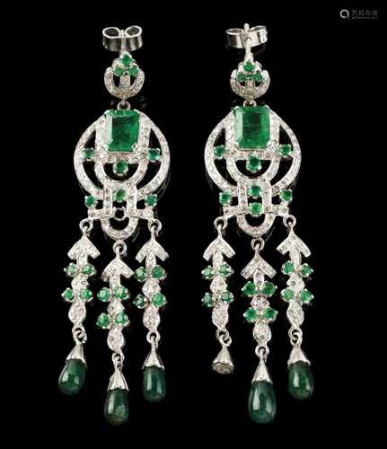 A pair of earringsGold, in the Belle Époque stylePierced decoration, set with two emerald cut