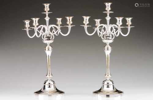 A large pair of 5 branch candelabraSilver plateIn the neoclassical stylePlain shaft, stand, cups and