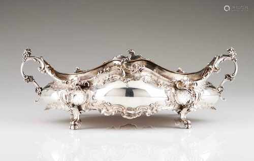 A large Romantic jardiniereSilverProfusely decorated with raised and chiselled foliage scroll