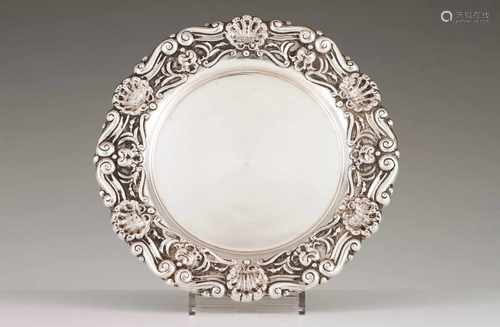 A salverPortuguese silverPlain base; gadrooned lip of raised decoration with foliage scroll motifs