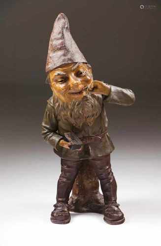 A garden gnome with a boxPolychrome terracotaAustria, 19th centuryHeight: 81,5 cm