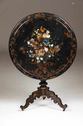 A Napoleon III tripod tableBlack lacquered woodInlaid mother-of-pearl and gilt decorationTilt-