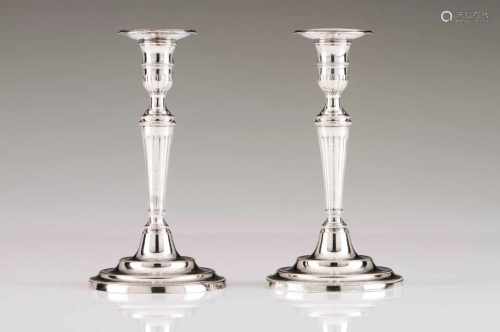A pair of D.Maria candlestandsPortuguese silverTurned, fluted shaft with fluting nd beading