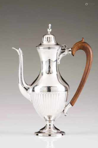 A D.Maria coffee potPortuguese silverGrooved fluting body with chiselled garlands, medallions and