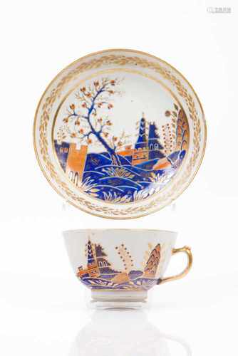 A cup and saucerChinese export porcelainRich polychrome decoration in shades of blue, salmon and