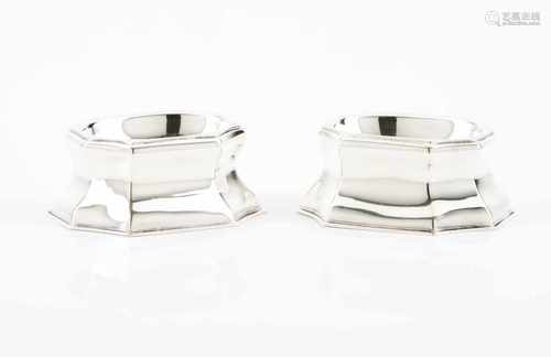 A pair of salt cellarsPlain English silverOctagonal base with raised body of equal shapeLondon