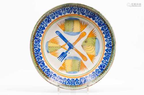 A platePortuguese faiencePolychrome decoration depicting fish and forksPortugal, 19th century(