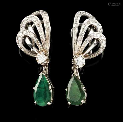 A pair of earringsGoldThe top set with 2 brilliant cut diamonds totaling (ca.0.20ct) and vatious 8/8