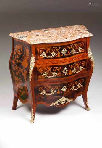 A Louis XV style commodeRosewood veneered with various woods floral marquetryGilt bronze