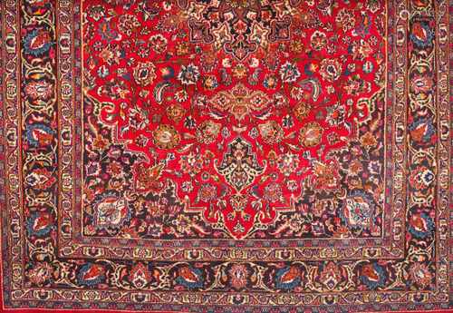 A Mashad rug, IranWool and cottonFloral pattern in bordeaux, blue, green and beige shades358x250 cm