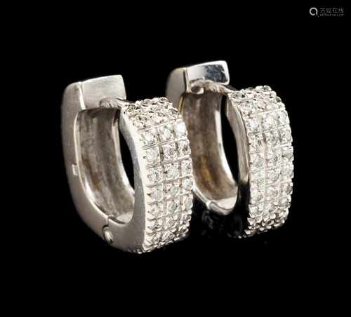 A pair of earringsGoldLoops set with brilliant cut diamonds totaling (ca. 0.70ct)Oporto hallmark,