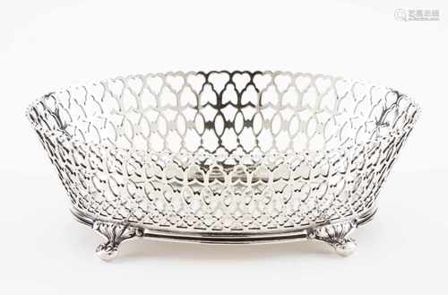 A basketPortuguese silverPlain oval shaped, on four claw and ball feet and scallopedand pierced