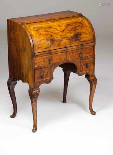 A Victorian roll top deskWalnut and burr walnutFour drawers and interior with pigeon holes, one