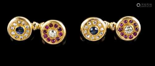 A pair of cufflinksGoldCircular, each set with 2 antique brilliant cut diamonds (ca.0.50ct) and 2