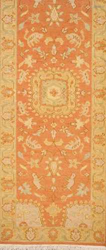 A Soumak rug, IranWool and cotton of floral and animal design in orange, yellow and green