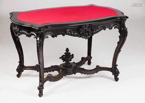 A Romantic tea tableEbonisedCarved decorationRed felt lined topPortugal, 19th / 20th(signs of wear)