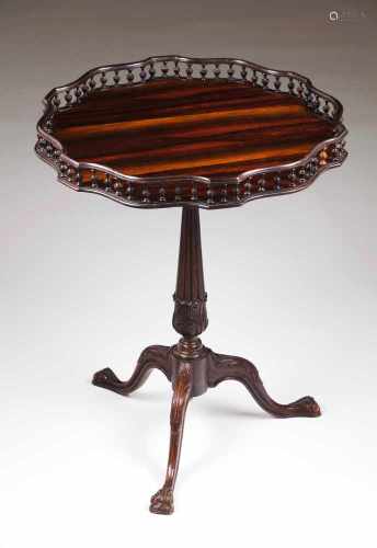 A Chippendale tripod tableRosewoodTilt-top with gallery and birdcage mechanism, on a fluted and