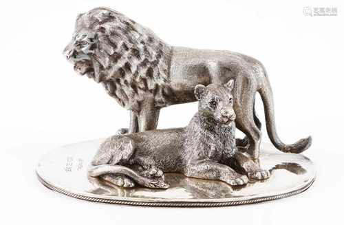 A pair of lionsPortuguese silverSculpture depicting a Kizigo (Tanzania) lion and lioness on an