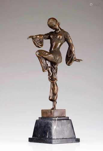 DancerReproduction, Dimitri Chiparus modelPatinated bronze sculpture, black marble baseHeight: 48