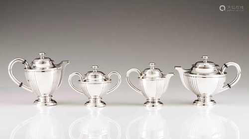 A retro tea and coffee setPortuguese silverPlain body with vertical fluting on a circular foot;