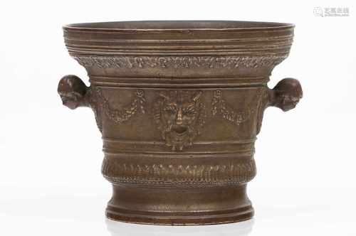 A large mortarRaised bronze with classical masks and flower garlandsInscribed MDCXXXEurope, 17th