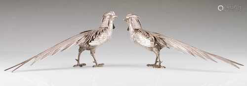 A pair of pheasantsSilverRaised and chiselled pheasant sculpturesSpanish hallmark, 20th century