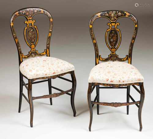 A pair of Napoleon III chairsBlack lacquered woodInlaid mother-of-pearl and gilt decorationFabric