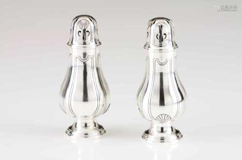 A pair of shakersEuropean silverTurned body of engraved decoration with raised shellsEurope, first-