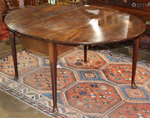 Queen Anne style drop leaf table, circa 1890, rising on